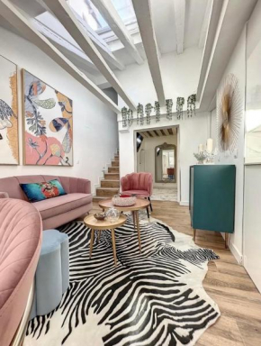 Chic Penthouse with Urban Charm & Rooftop